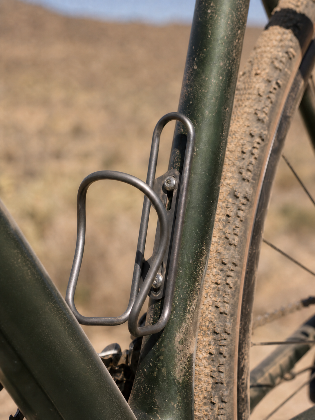 Titanium bottle cage