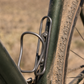 Titanium bottle cage